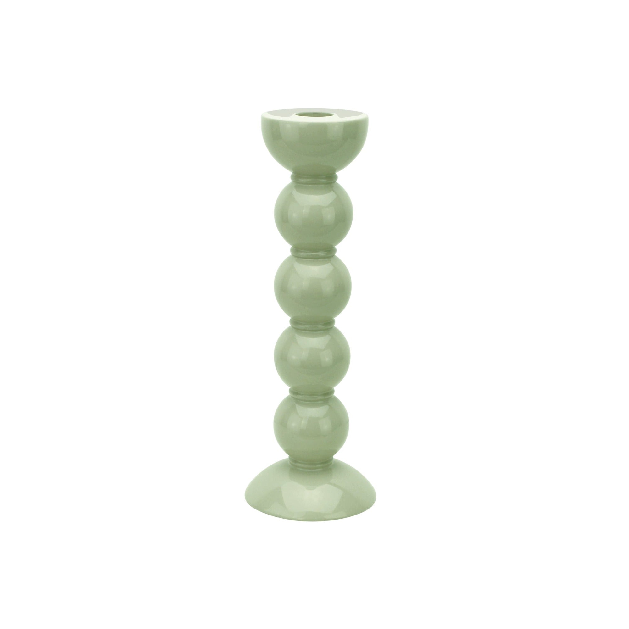 Green lacquer candle holder on a white background
