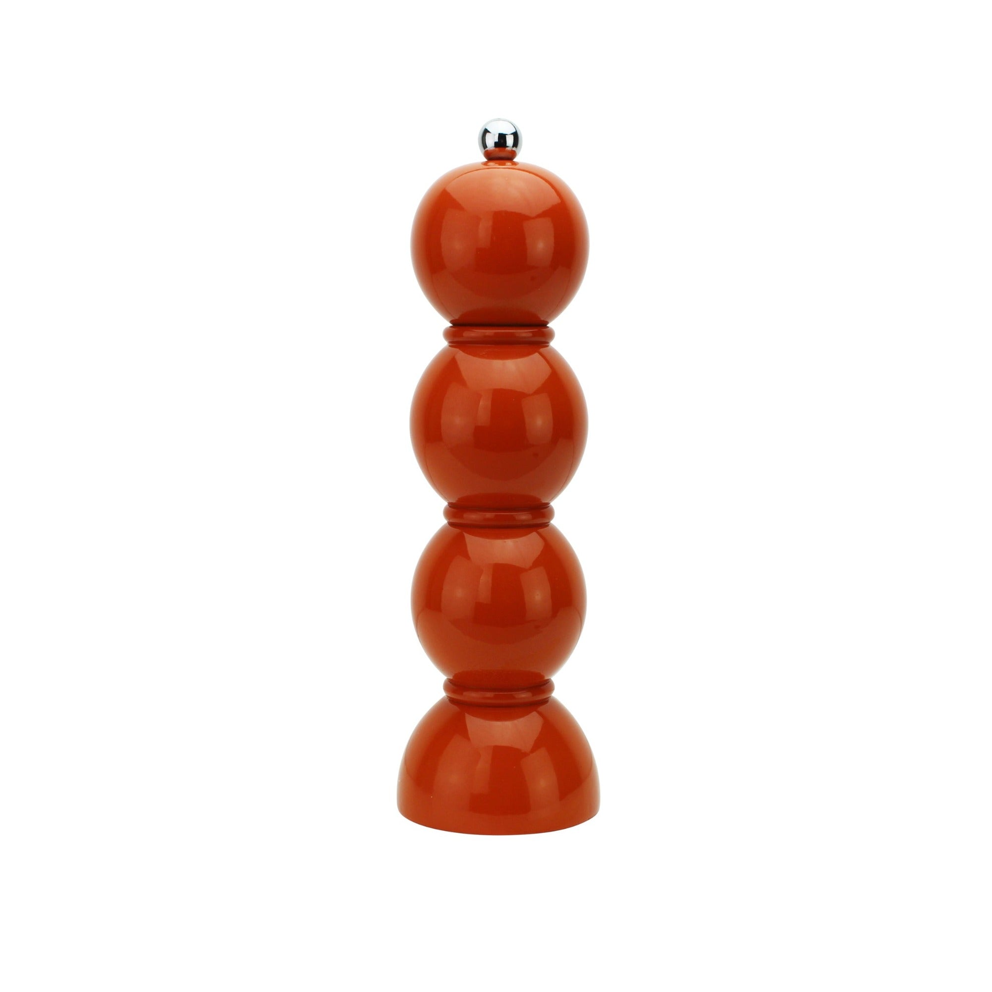 Orange pepper grinder on a white background